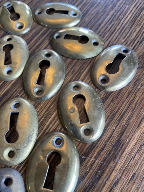 Lot of 18 Antique Vintage Stamped Brass Keyhole Plates Escutcheons 1 5/8" x 1" 3