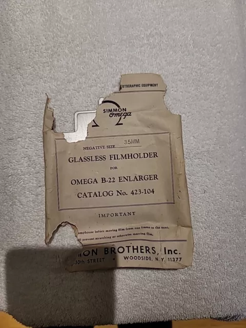 Soporte de película sin vidrio Simon Brothers Omega B-22 y condensador suplementario 472-001