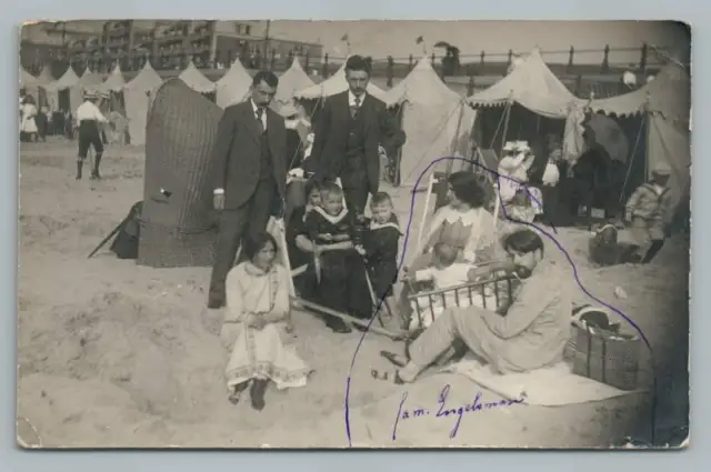 Over-Dressed Family at North Sea Beach RPPC Dutch? "Englesman" Photo 1910s