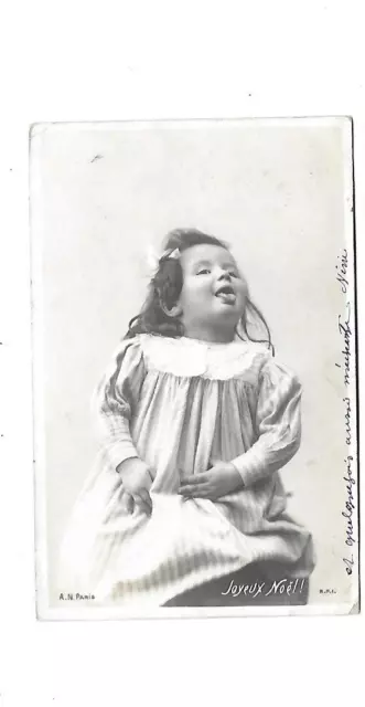 belle CPA carte postale ancienne  Joyeux Noël fillette tirant la langue !  1903
