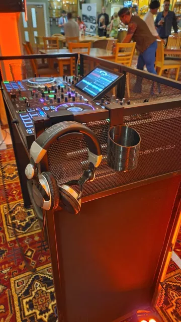 Headphones and drink holder for portable folding DJ booths.