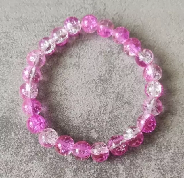 Bracciale elasticizzato con perle in vetro crackle rosa e bianco