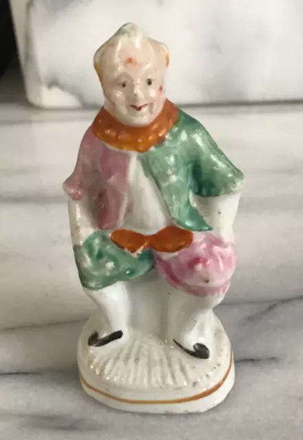 Antique Ceramic Staffordshire Miniature Figurine, Clown Sat On Stool 10cm High