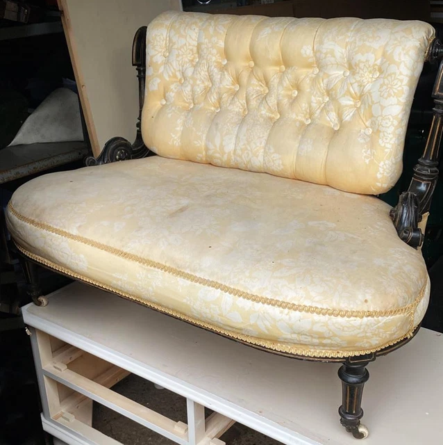 Antique - Regency - low seat with reeded legs, rolled, upholstered buttoned back