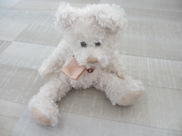 ours en peluche doudou avec noeud rose