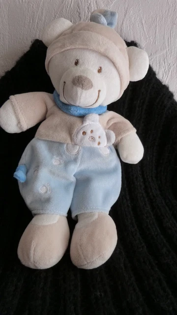 doudou peluche nicotoy ours bleu ,blanc,beige ,empreintes bonnet