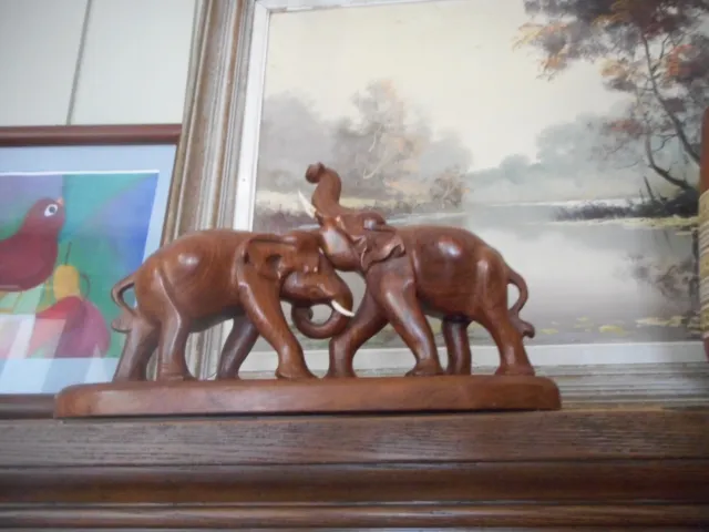 ESTATE SALE - collection of carved hard wood elephants