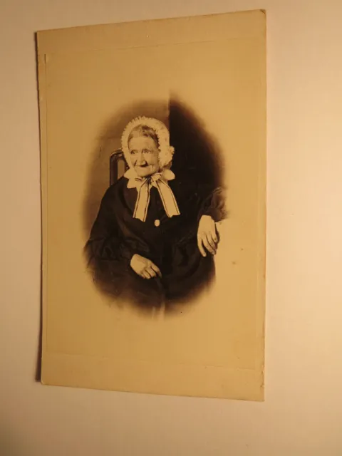 seated old woman with hood - circa 1860s / CDV