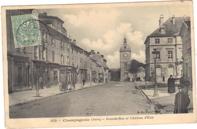 39 - cpa - CHAMPAGNOLE - Grande-Rue et Château d'eau