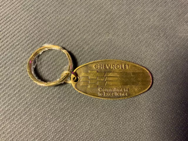 Chevrolet Commitment to Excellence brass key chain fob return ID