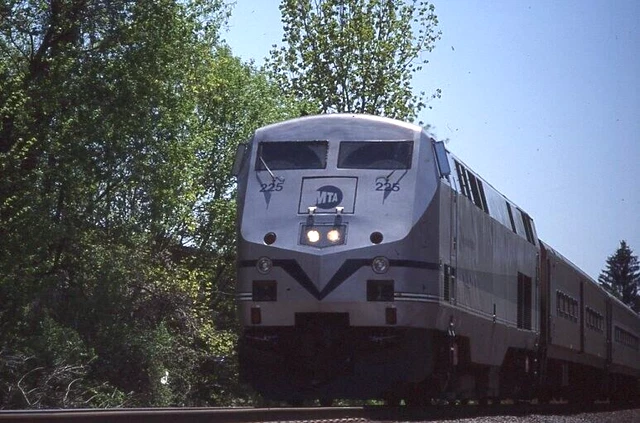 METRO NORTH RR 2004 slide. GE P32 GENESIS diesel 225 speeds north thru Pawling