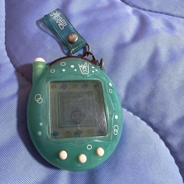 TAMAGOTCHI CELEBRATION MOBILE Phone Two Tamagotchi Plus Melon Soda