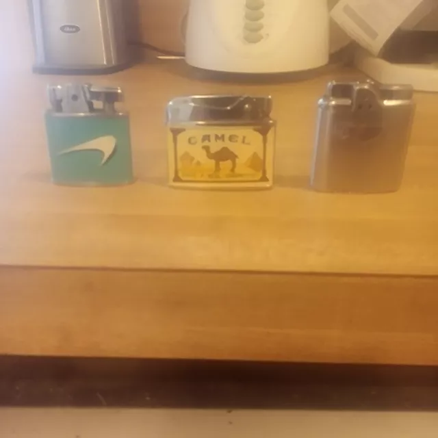 Camel and Newport vintage refillable butane lighters