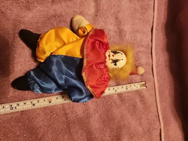 Vintage Artmark Blue And Yellow Porcelain Faced Sand Body Clown Doll