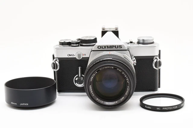 OLYMPUS OM-2N + 50mm F1.8 LENS in WORKING ORDER BUT GRUBBY