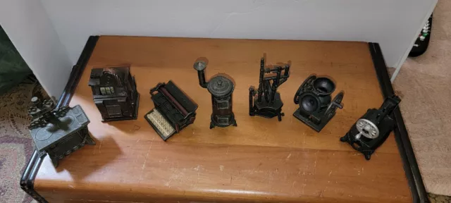 7 Unique pencil sharpener's vintage Slot Machine,2 Stoves,Type Writer,Sewing Mac