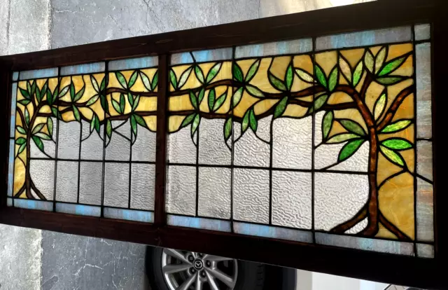 Stained glass window with interesting climbing vines