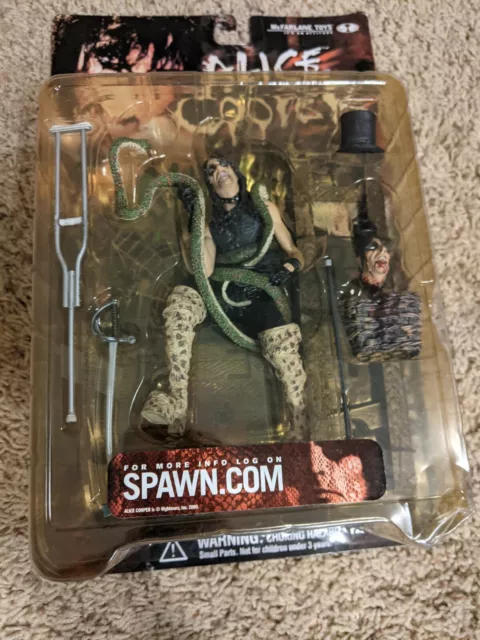 FIGURINE JOUETS ALICE COOPER SERPENT CONCERT SCÈNE GUILLOTINE TÊTE SUPPLÉMENTAIRE McFARLANE NEUVE