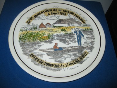 Assiette decor signé Henri simon bretonnes au calvaire 
