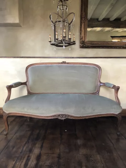Antique Walnut French Louis Sofa Upholstered in a Soft Pale Green  - Very Solid