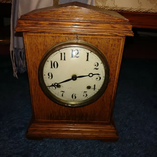 A 19th Century Oak Cased Mantel Clock Circular Painted Dial with Arabic Numerals