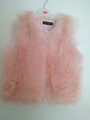 Girls Pink winter faux fur gilet body warmer.