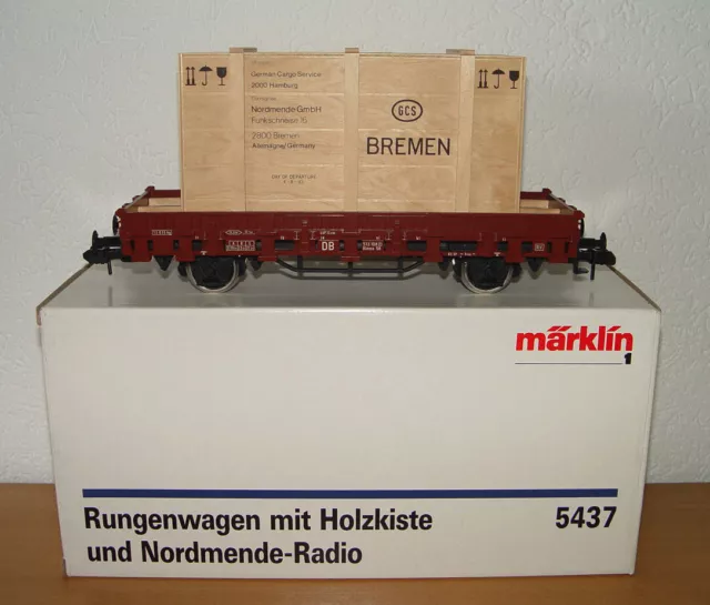 Märklin 5437 Rungenwagen mit Holzkiste und Normende-Radio Spur I OVP