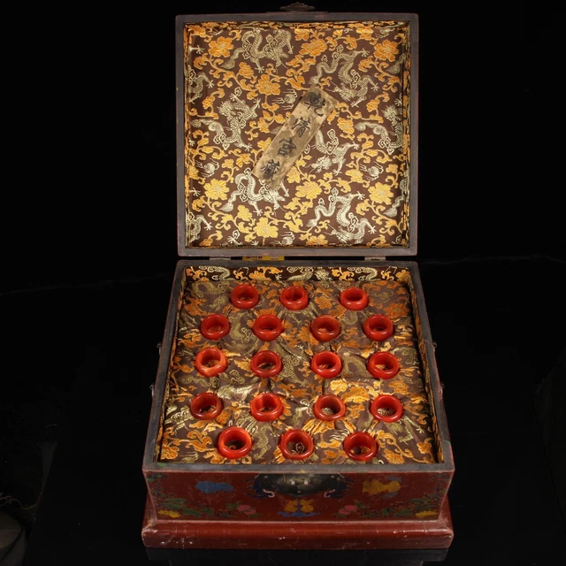 A box of rare and exquisite handmade red cat's eye stone ring for collection