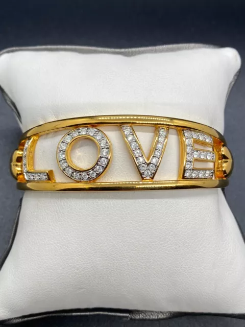 Wonderful Vtg SWAROVSKI Gold Tone & White Crystals LOVE Hinged Bangle Bracelet