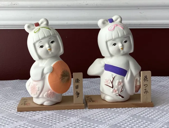 Set of 2 VTG Japanese Hakata Ceramic Dolls on Wooden Bases, Signed, 5 1/4”