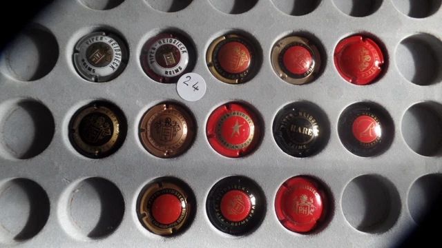 24: lot de 13 capsules de champagne PIPER HEIDSIEK côte=51,5,bon état