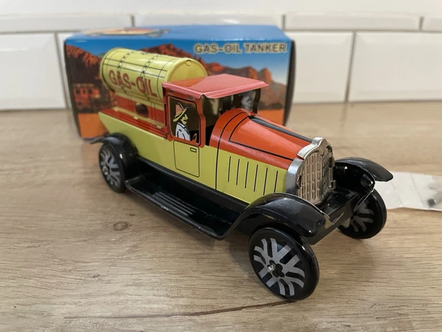 Jouet Ancien Camion FJ GMC benne basculante en tôle mécanique sans sa clé
