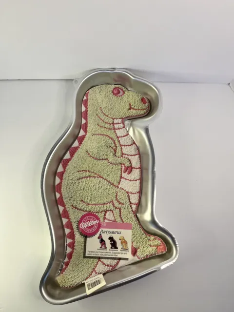 https://www.picclickimg.com/66MAAOSw71Zlj3IL/Vintage-1987-Wilton-Partysaurus-Dinosaur-T-Rex-Cake-Pan.webp