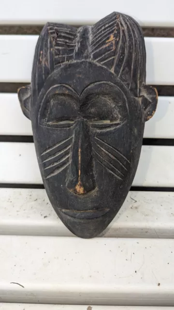 Masque Africain très ancien en bois sculpté Dan ?