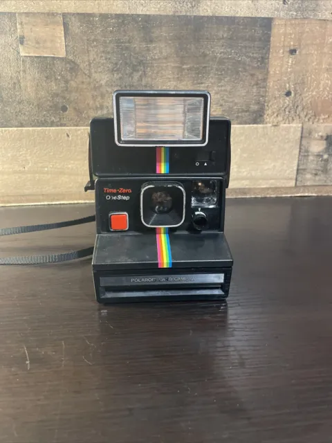 Cámara terrestre instantánea vintage negra Polaroid de un paso a rayas arco iris con flash TG8
