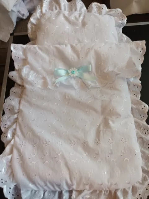 Hand made embroidery anglaise dolls pram set. white cover and pillow blue bow.