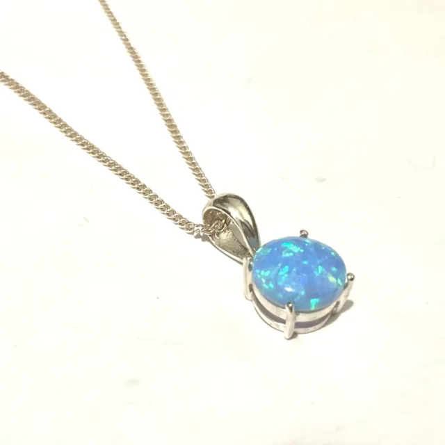 STERLING SILVER Light Blue Fire Opal round cabochon claw set pendant necklace