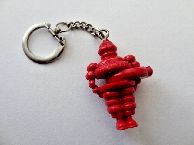 Vintage keychain Michelin Bibendum dexterity puzzle  tyre man red.