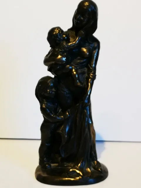 Figurine Of Loving Mother And Two Children.