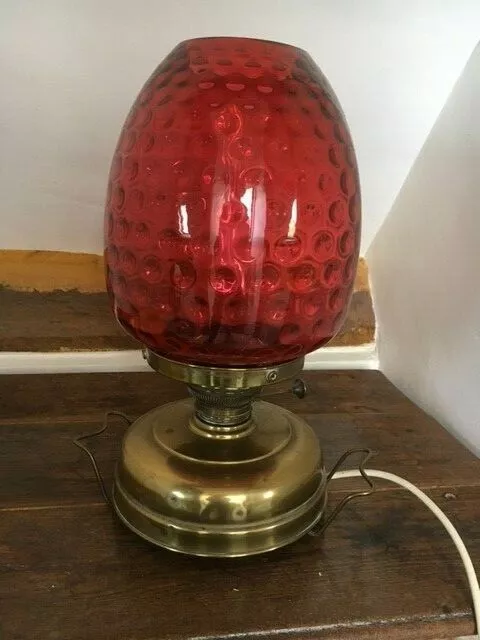 Victorian oil lamp with cranberry glass, converted to electric