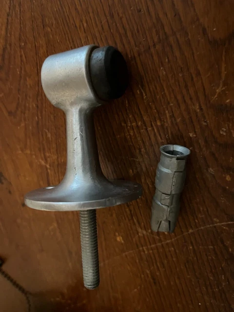 Antique vintage nickel plated brass heavy door stop with wall mount