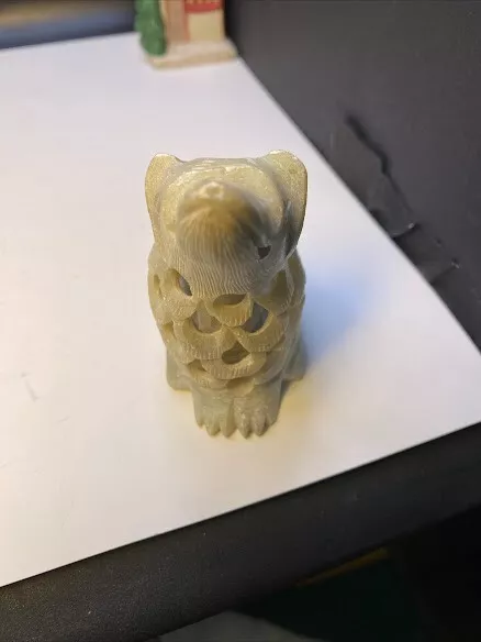 soapstone hand carved coyote with puppy inside