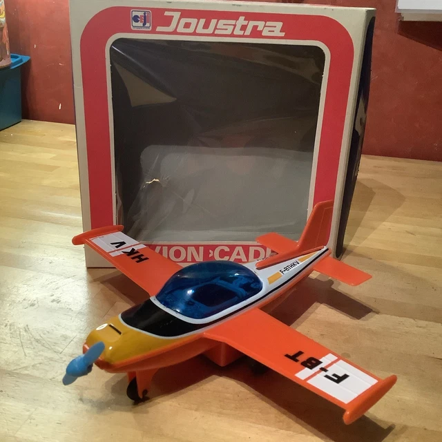 Joustra Avion Cadet Flugzeug teils Plastik teils Blech, mit Schwungrad und OVP