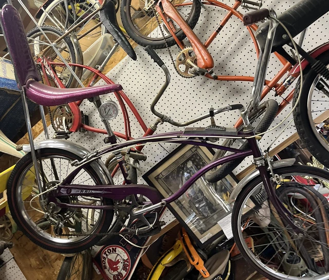 purple huffy bike