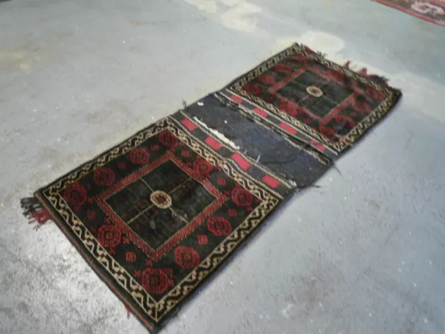 A lovely large Old Belouch oriental saddle bag ( 5ft.9" x 2ft.5" )