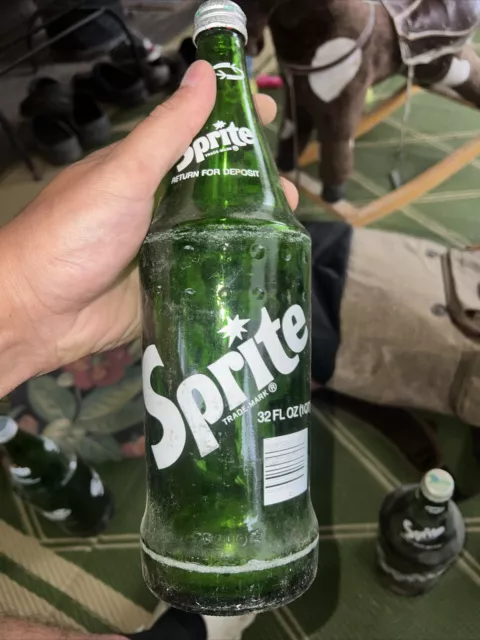 Sprite 32 oz Green Glass Dimple Sprite 32 oz Bottle Opened Product of Coca-Cola