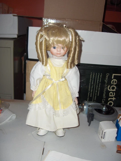 The heritage mint ltd collection 16 inch  porcelain doll . Vintage