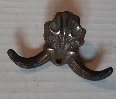Antique Copper Over Cast Iron Coat or Hat Hook, the hooks are 3+" wide