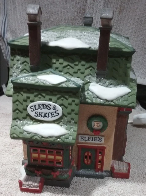 Dept 56 - North Pole  Heritage Village - Elfie's Sleds & Skates - #56251