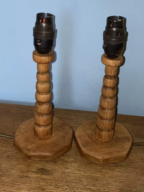 A Pair Of Wooden Bobbin Turned Lamp Made From Candle Holders